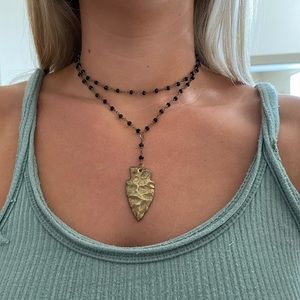 Black Beaded Necklace with Gold Pendant